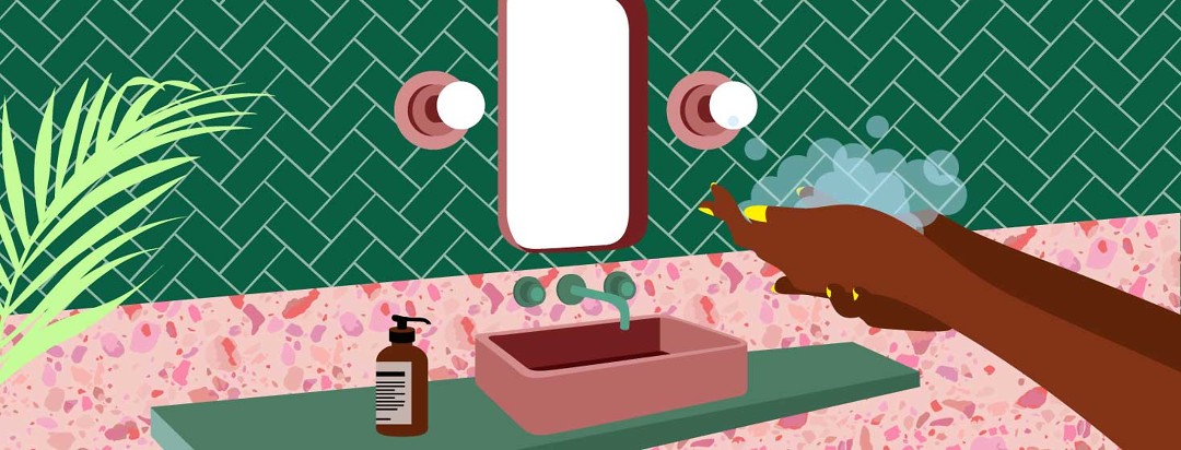 Bathroom scene with a woman washing her hands