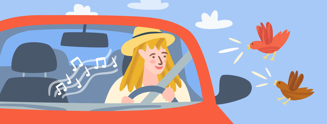 Smiling woman in her car listening to the radio and to birds chirping outside her window