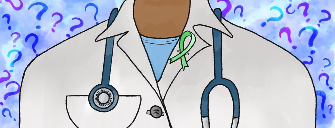 View of POC doctor with a stethoscope around their neck and a green mental health ribbon pinned to their collar.