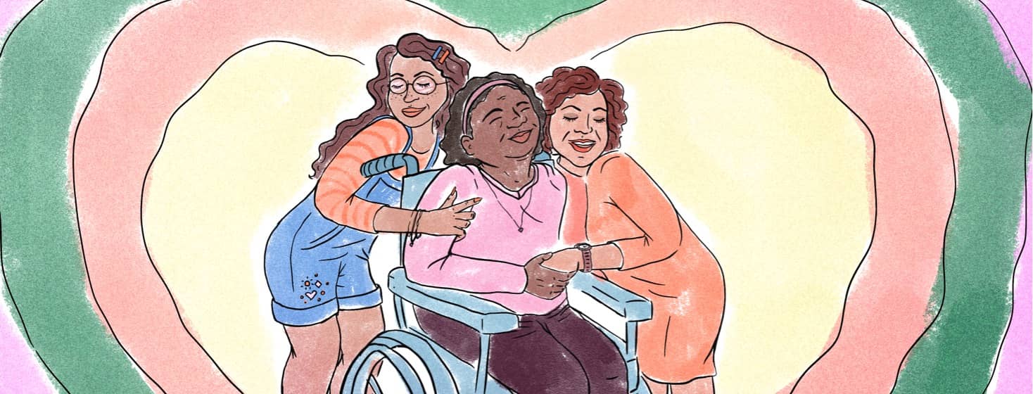 Woman in wheelchair is lovingly embraced by two family members