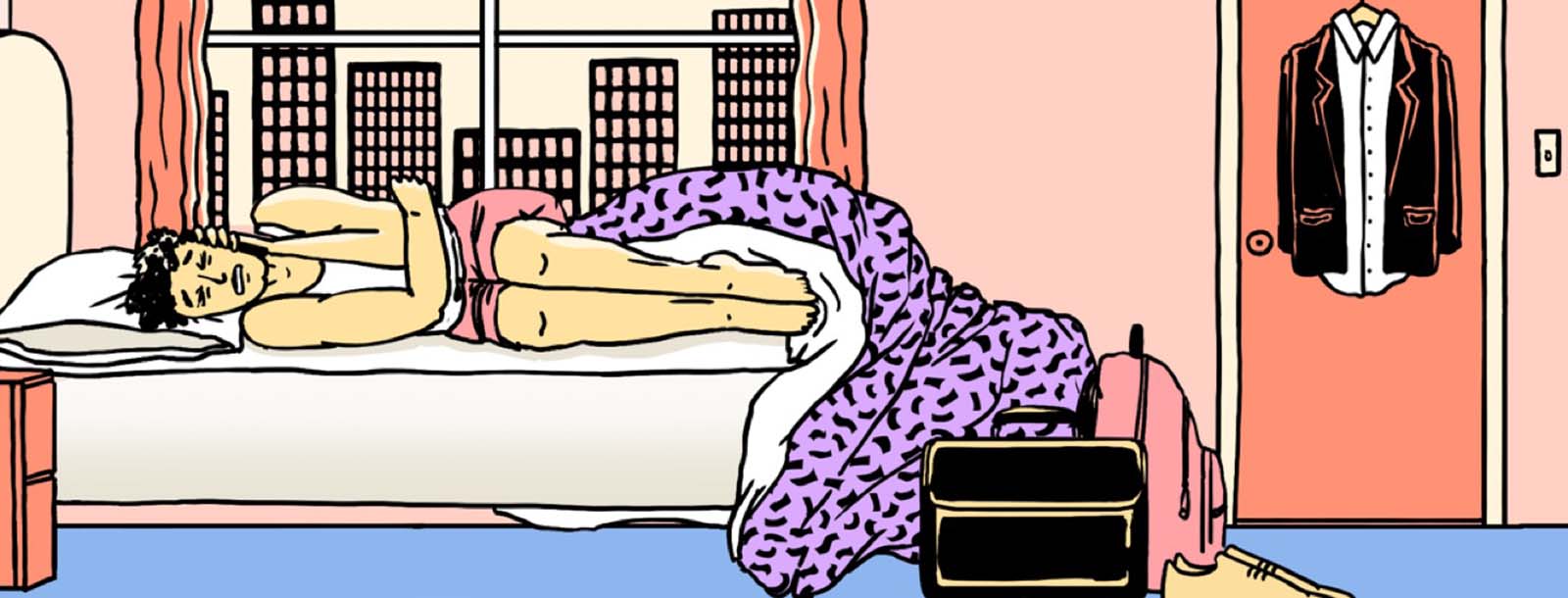 A person folds over in pain on their bed during the day on the phone